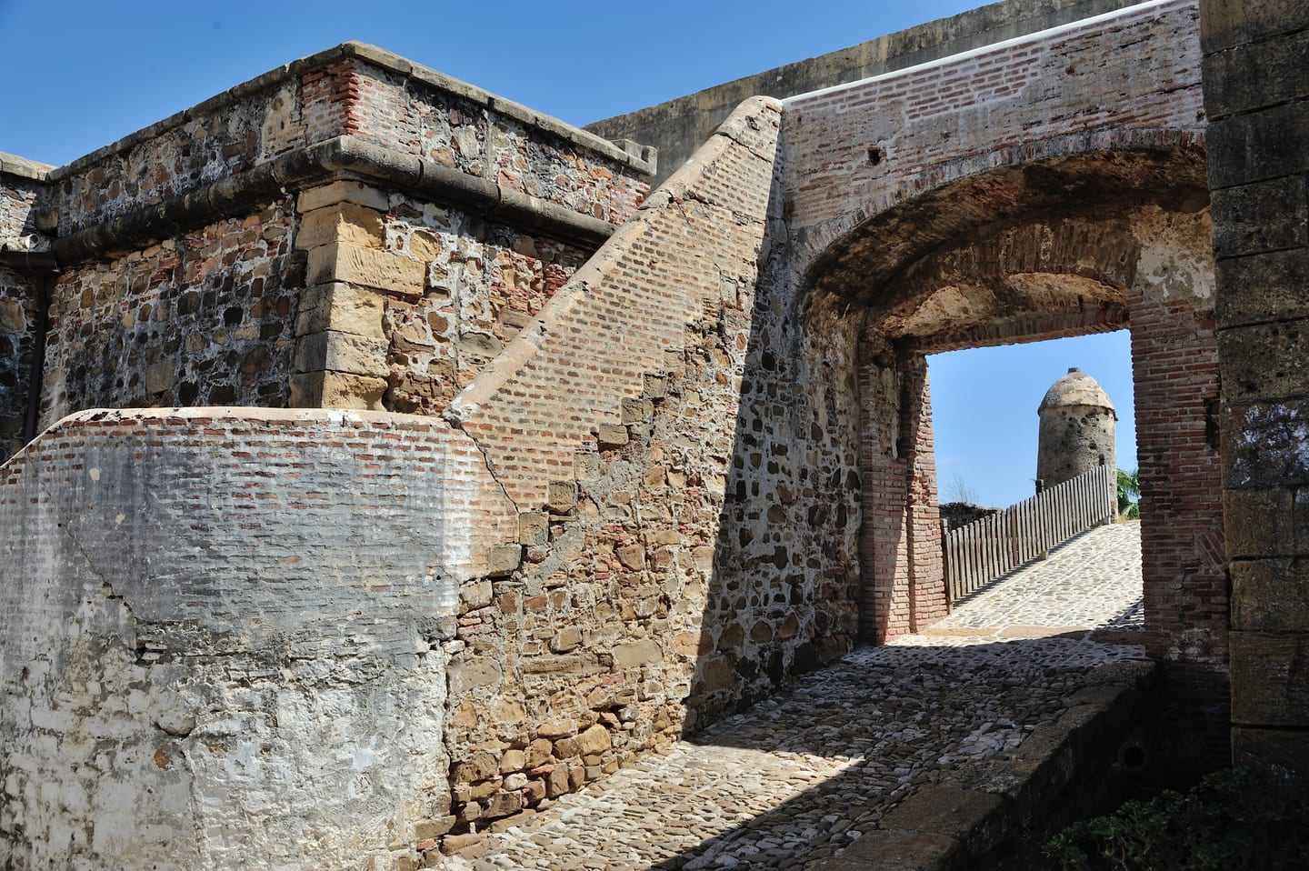 VESTA MARE — Area photograph: the entrance gateway and a turret of Castillo de la Duquesa in Manilva.