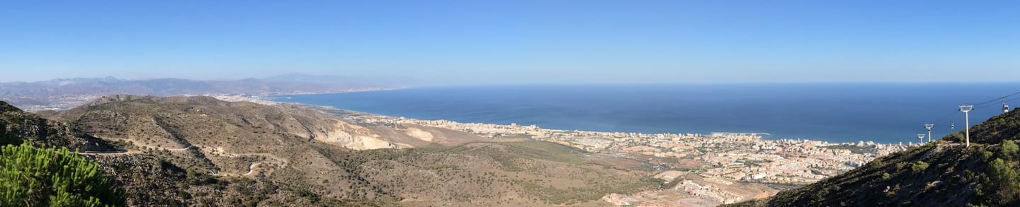 NORDIC: panoramic aerial view of Benalmádena, Arroyo de la Miel and the Costa del Sol coastline towards Málaga, taken from the Monte Calamorro Teleférico upper station