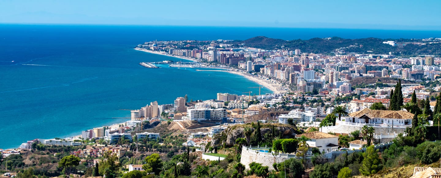 Panoramic aerial view of Fuengirola coastline, beach, marina and townscape, Costa del Sol, Spain, shown as local context near THE BAY 7