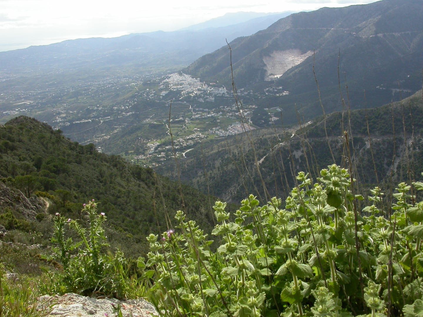 Panoramic mountain landscape view from Sierra de Mijas toward Alhaurín de la Torre and the Costa del Sol coast, shown as local context near VILLA SANTHAI 3 Y 9