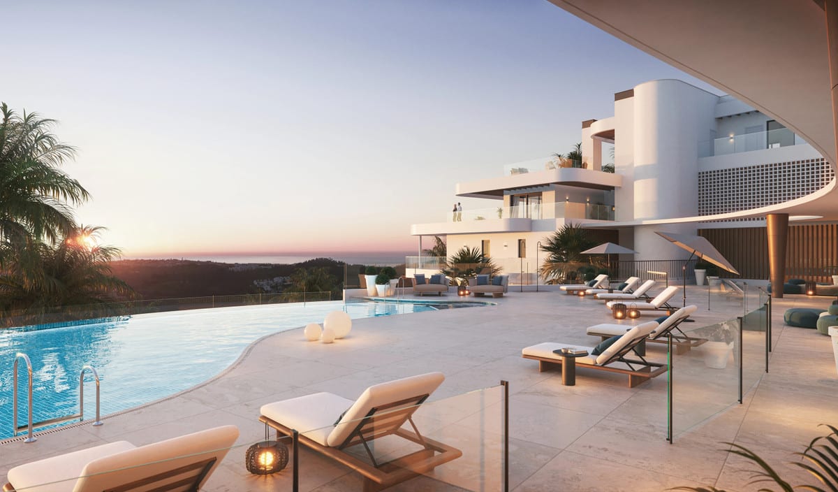 Rendered visualisation of 360º BY CORDIA with an organically shaped swimming pool, sun loungers, glass balustrades and white buildings at sunset.