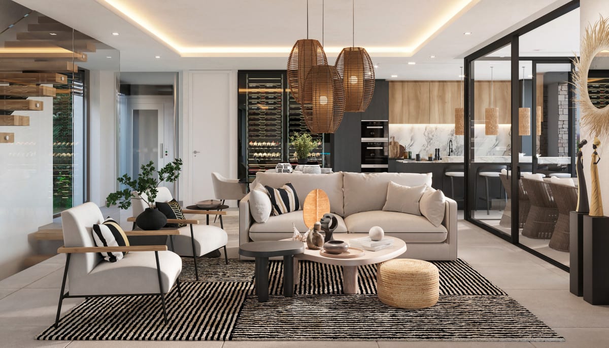 Visualisation of a living area with a sofa, armchairs, pendant lights and an open kitchen in the background.
