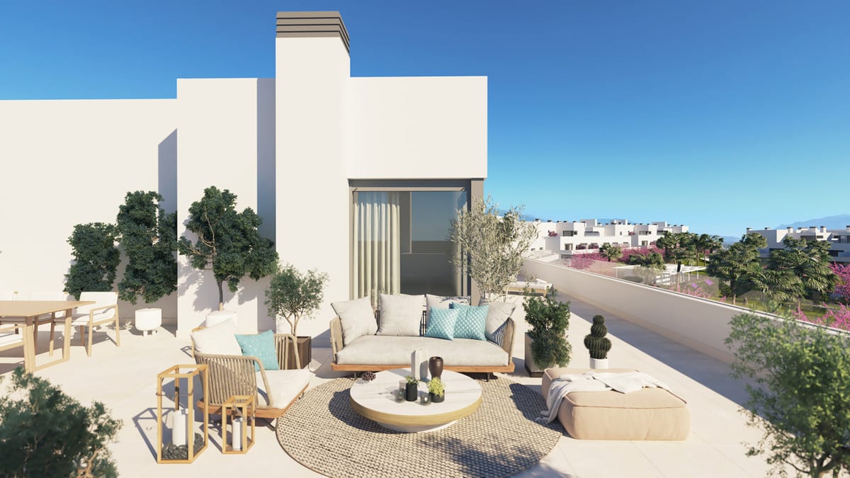 Artist's impression of ACQUA GARDENS featuring a spacious upper terrace with a lounge sofa, armchair, round coffee table, olive trees, cacti and a wooden dining table with chairs on the left.