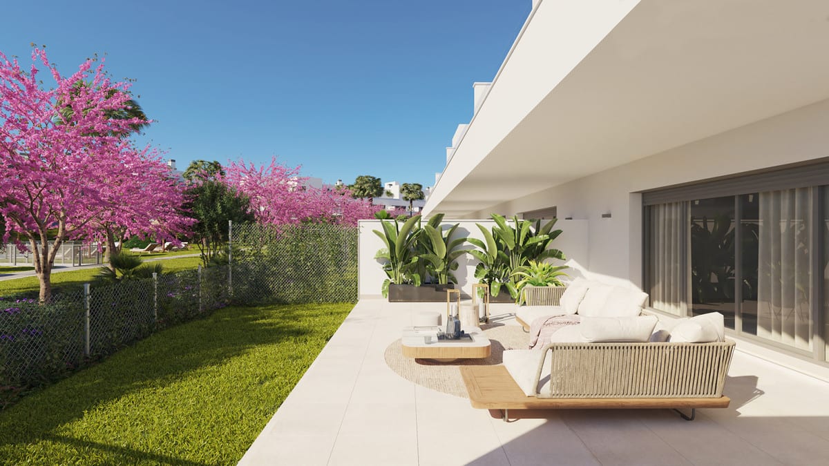 Artist's impression of ACQUA GARDENS featuring a ground-level terrace, white lounge sofa, coffee table, large planters with tropical plants and pink-flowering trees beside a lawn.
