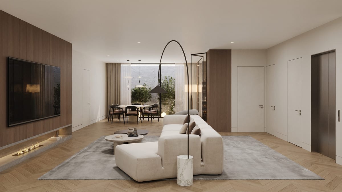Living room visualisation with a pale sofa, television, fireplace and a dining area in the background.