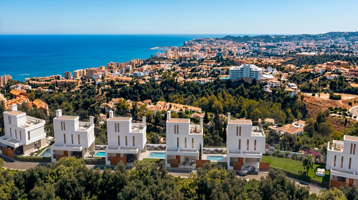 Aerial project visualisation of ALMARA VILLAS showing a row of white buildings, private swimming pools and a coastal town with the sea in the background.