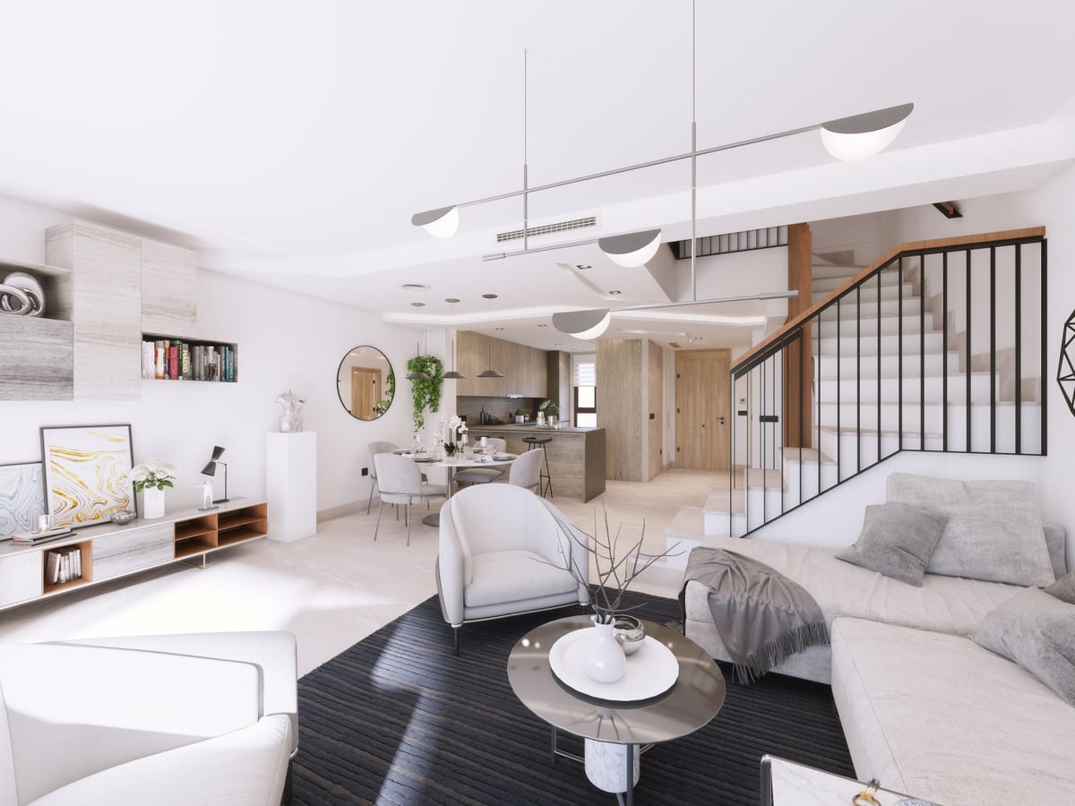 Project visualisation of ALMAZARA VIEWS (TOWNHOUSES) featuring a bright living room, open-plan kitchen, dining area, dark rug, black metal stair balustrade and timber wall cabinets.