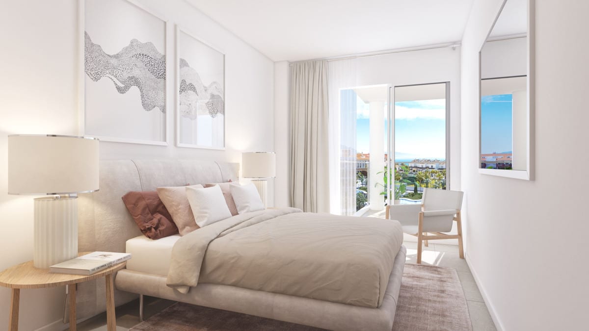 Project visualisation of a bedroom at AMPHORA BEACH FASE IV with a double bed, bedside tables, light curtains, a chair and glazed French doors.