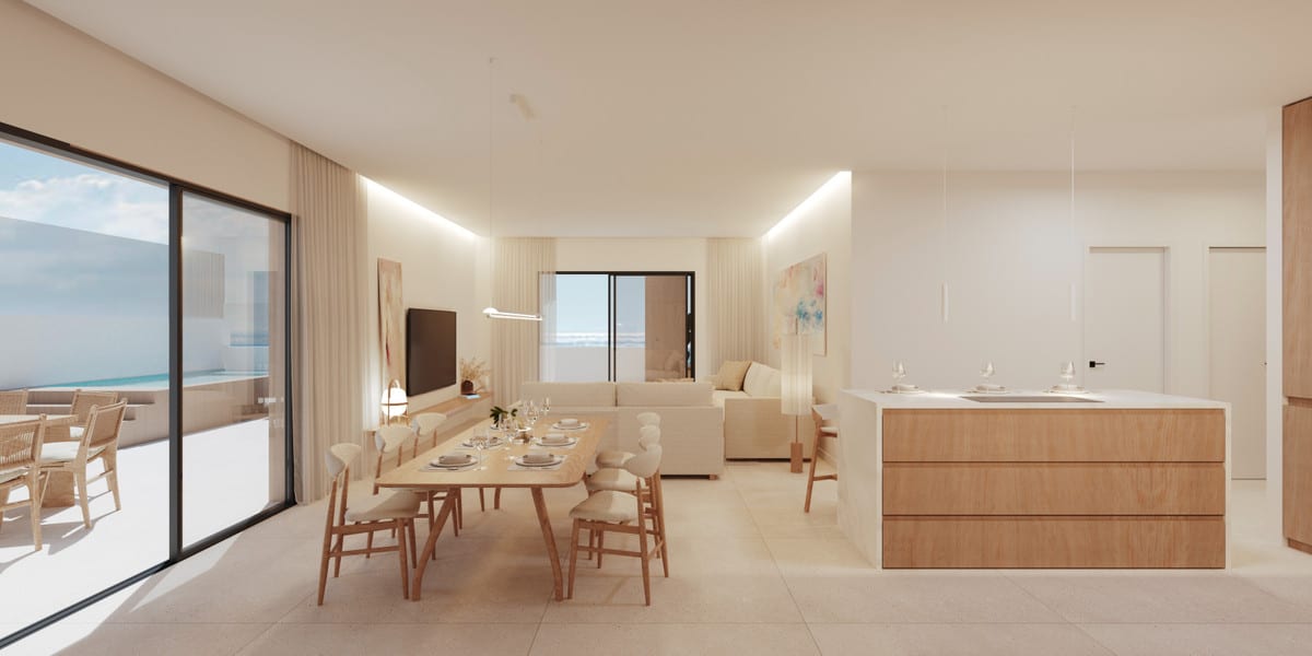 Project visualisation of ARMONIA featuring an open-plan living space, wooden dining table, light kitchen with island and a large glass sliding door leading to the terrace.