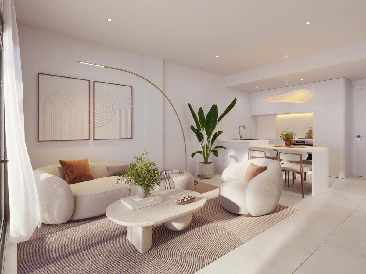 Rendered interior visualisation of ASTRA HOMES featuring an open-plan living and dining area: a oval coffee table, curved floor lamp, large houseplant, dining area and white open-plan kitchen with island.