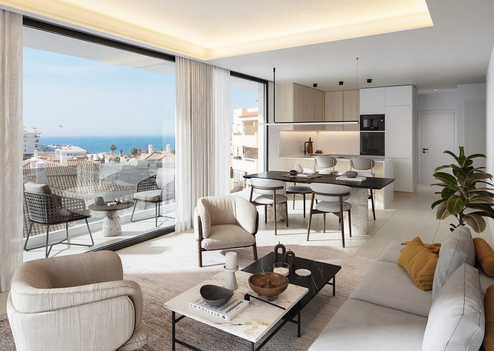 Project visualisation of BELVEDERE COLLECTION featuring a bright living space, open-plan kitchen, dining table, glass sliding doors to a balcony and sea views in the background.