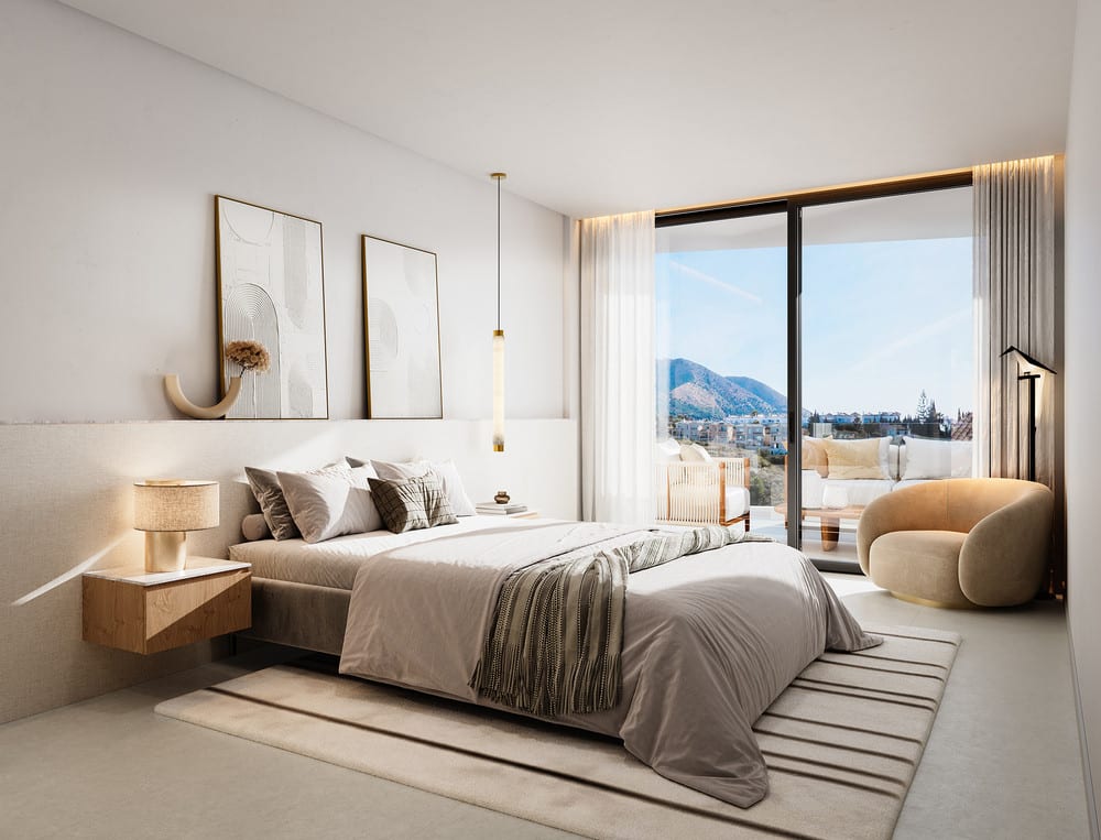 Project visualisation of BELVEDERE COLLECTION featuring a bedroom, double bed, floating wooden bedside table, rounded armchair and glass sliding doors to a terrace.