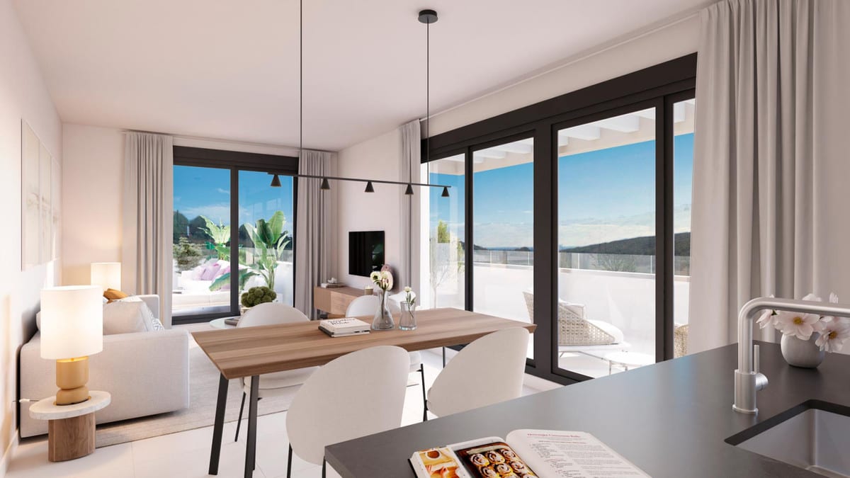 Development visualisation of BLISS HOMES looking from the kitchen towards the dining area and living room, with large sliding glass doors and a terrace.