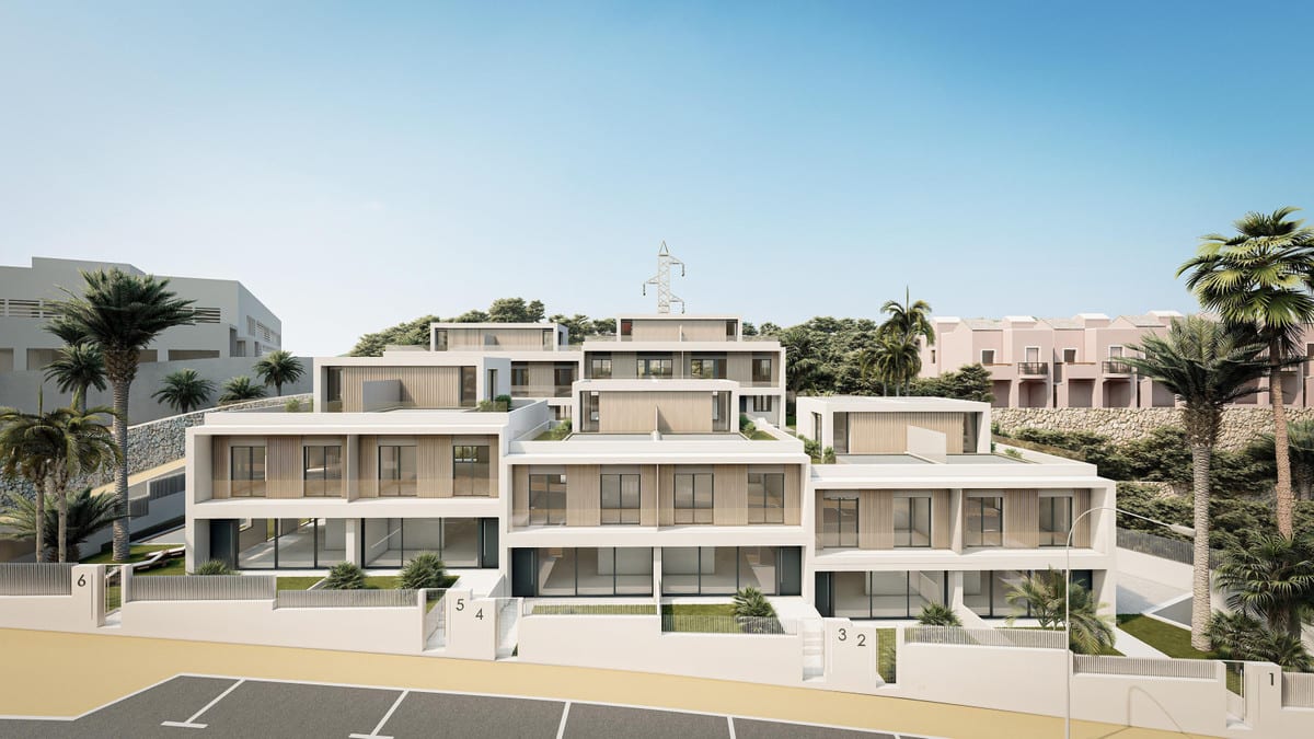 Rendered front view of BRISAS DEL MAR with light-coloured buildings, wide glazed façades, vertical wood-effect slats, numbered entrances and palm trees along the street.