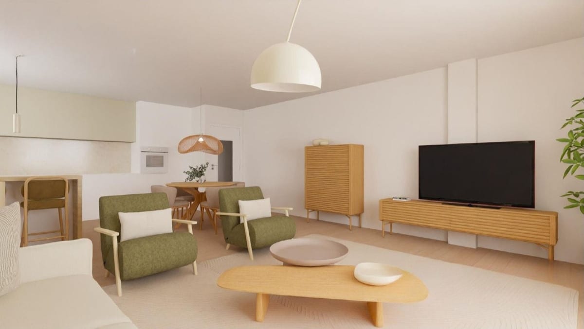 Interior visualisation of CALLE MIRÓ with two green armchairs, an organic wooden coffee table, a cream dome ceiling lamp, a wooden TV unit with a flatscreen TV, a tall wooden cabinet and an open-plan kitchen with breakfast bar on the left.