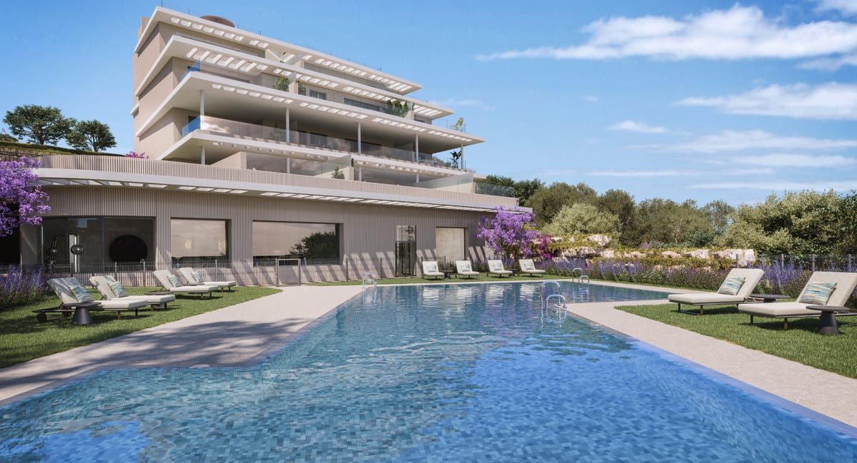 Development visualisation of CAPRI - FASE 3 with a swimming pool, lawn areas with sun loungers and a modern building with wide balconies.