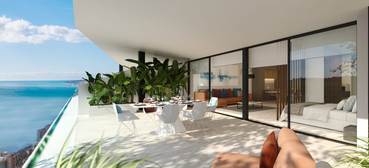 Project visualisation of CARAT with a spacious terrace, white round dining chairs and table, large tropical plants in planters and wide glass sliding doors leading indoors.