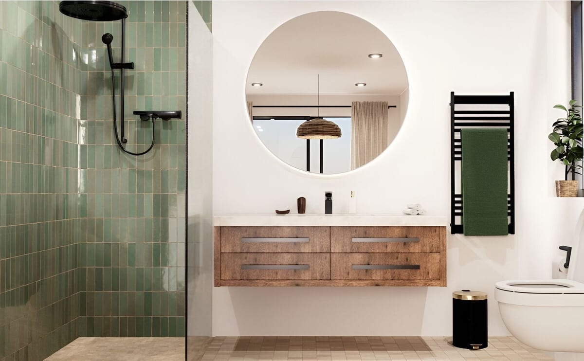 Project visualisation of the bathroom at CASA 2 - BOUGAIVILLEA ROSA with green wall tiles, a walk-in shower, wooden vanity unit and round mirror.