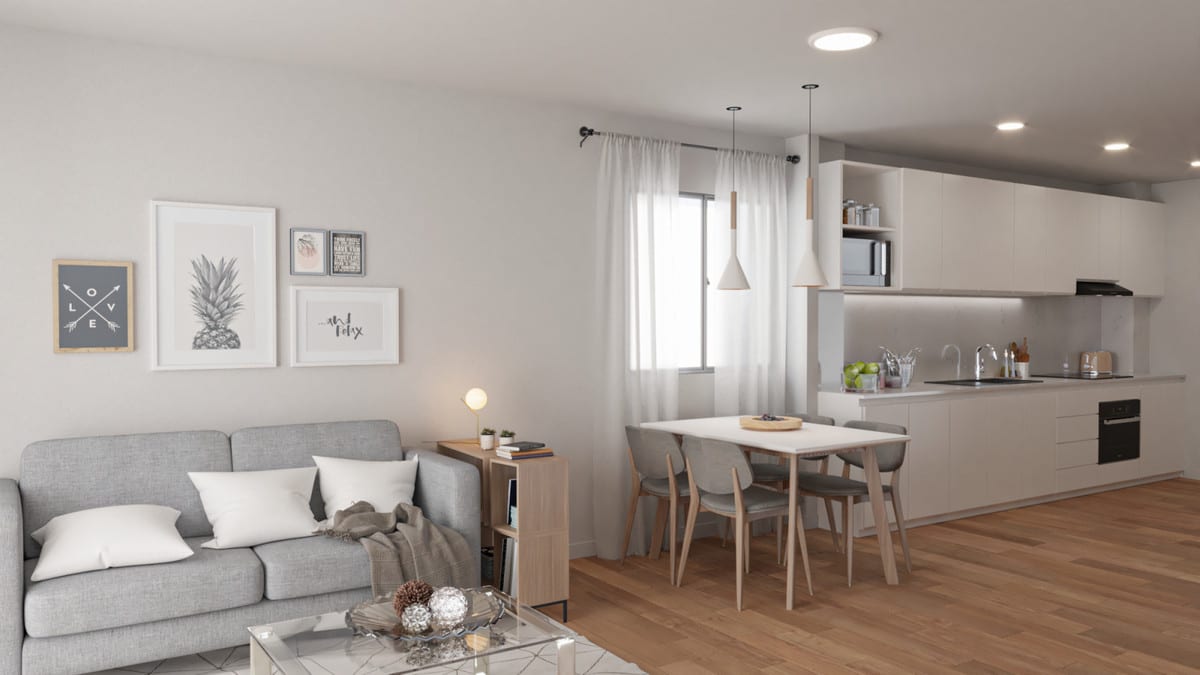 Project visualisation of CORAL MIJAS RESIDENCIAL with a grey sofa, glass coffee table, dining table and chairs, white kitchen units and framed artwork on the wall.