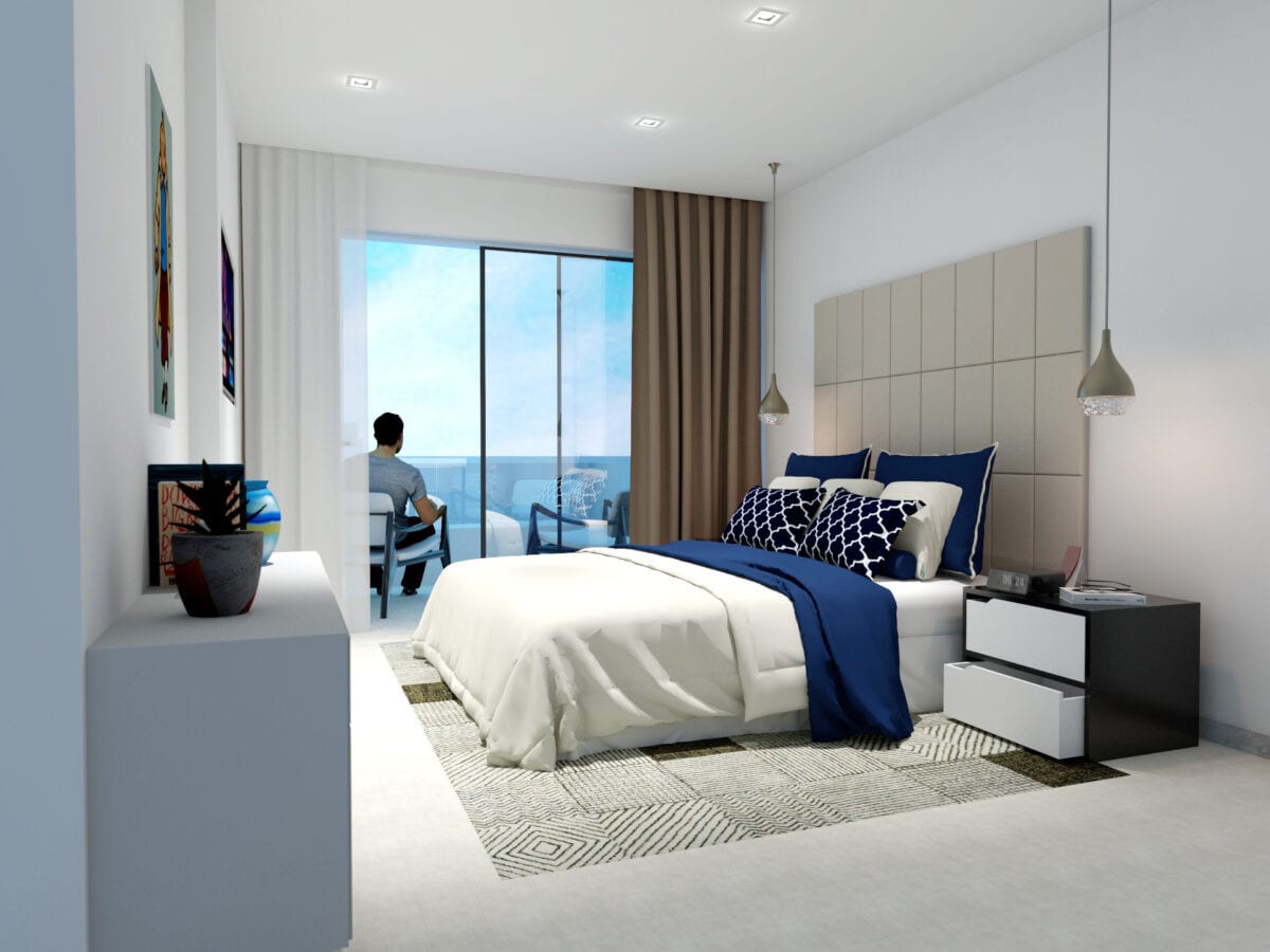 Project visualisation of COSTAFIORE GARDENS - FASE 1 featuring a bedroom, blue bedding, upholstered headboard and glass sliding doors to an outdoor area.