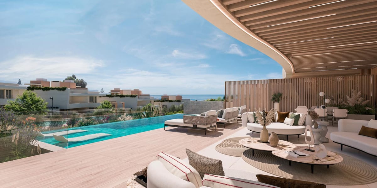 Project visualisation of a spacious terrace at DUNIQUE MARBELLA with a pool, lounge area and sea on the horizon.