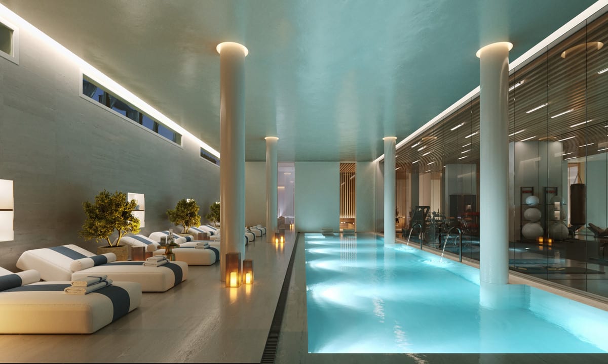 Visualisation of the indoor pool at EARTH, with loungers, soft lighting and a view of the adjoining gym.