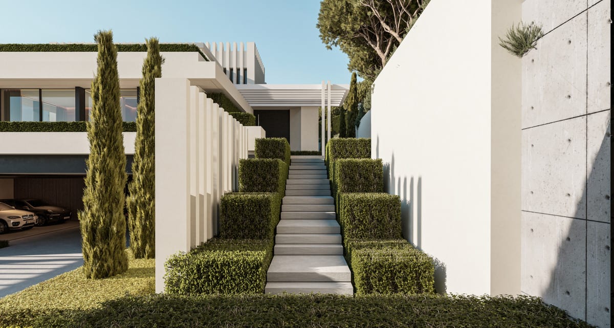 Entrance steps of VILLA FOREST BAY framed by clipped planting and white vertical architectural elements.
