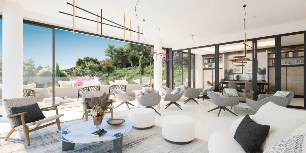 Visualisation of a bright lounge with armchairs, a sofa, large windows and a glazed adjoining room.