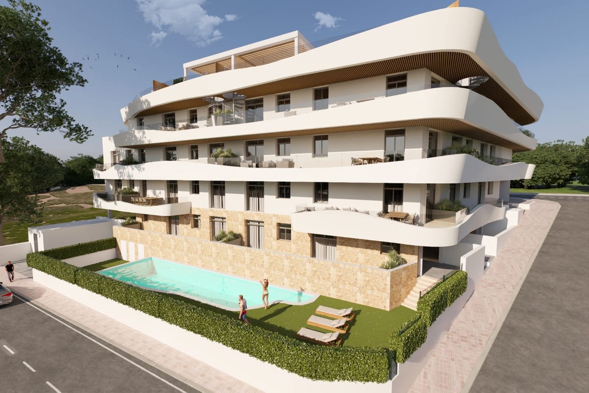 Project visualisation of GREEN MOUNTAIN 1 with cream-coloured curved balconies, a natural-stone façade plinth, a rectangular swimming pool, green hedge and wooden sun loungers.