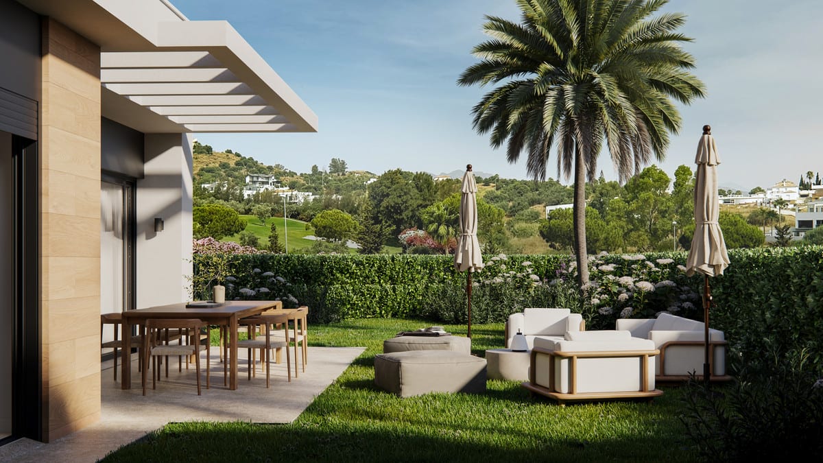 Development visualisation of GREEN VALLEY featuring a partially covered terrace, wooden dining table with chairs, light-coloured lounge seating with closed parasols, lawn, a palm tree and a green hillside backdrop.