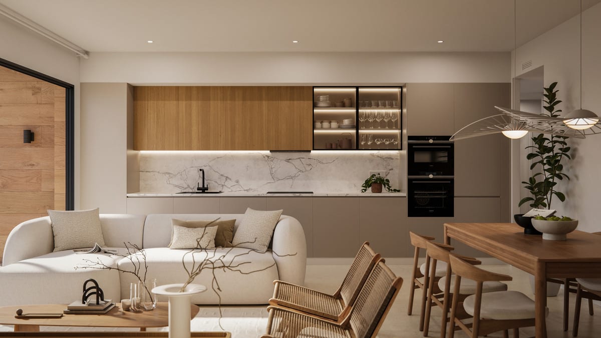 Development visualisation of GREEN VALLEY featuring an open-plan living space: a kitchen with wooden upper cabinets, taupe lower cabinets, marble-effect splashback, built-in oven, illuminated open shelving, a cream sofa, wooden dining table and pendant lights.