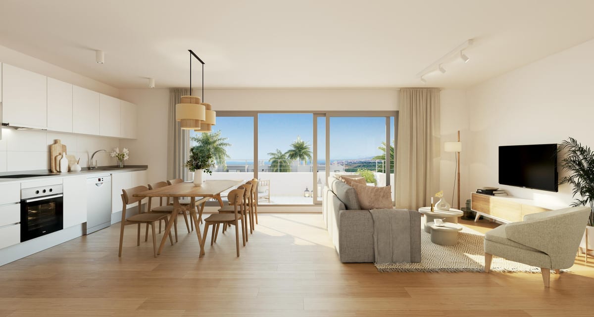 Bright open-plan living area with kitchen and terrace in an apartment at Habitat Valle Romano
