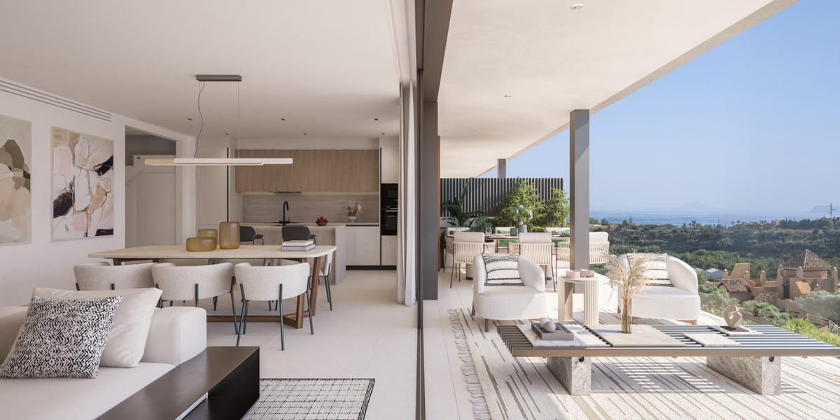 Project visualisation of HAIKU RESIDENCES with an open-plan living and dining area, kitchen with island and covered terrace with seating and dining area.
