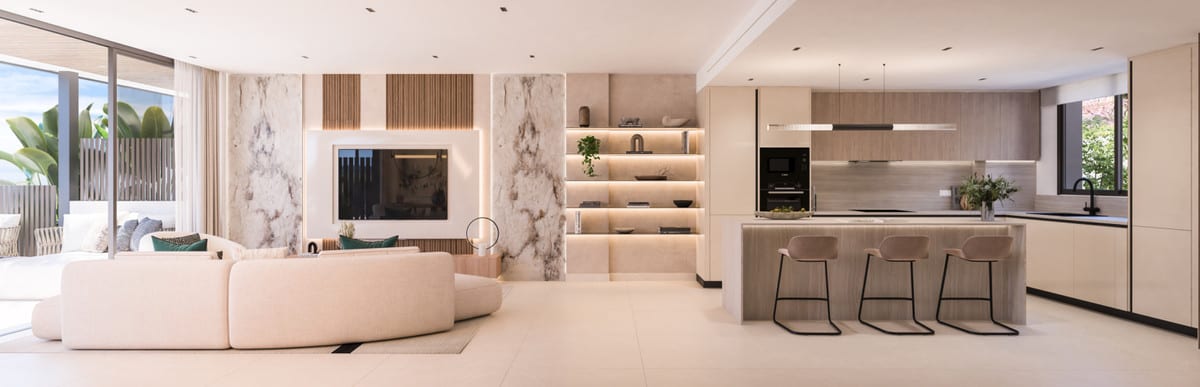 Project visualisation of HAIKU RESIDENCES with an open kitchen, cooking island with three bar stools, seating area, marble-effect wall panels and illuminated wall shelves.