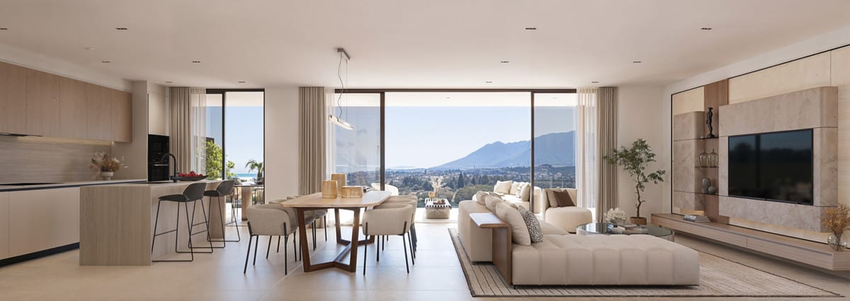 Rendered interior of HAIKU SUITES with an open kitchen, dining table, seating area and wide glass façade with mountains and water in the background.