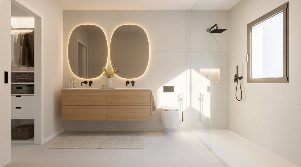 Rendered bathroom at HAIKU SUITES with a wooden vanity unit, two oval illuminated mirrors, toilet, walk-in shower with glass screen and window.