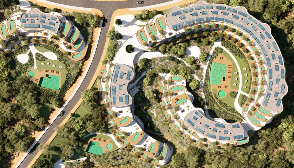 Rendered aerial visualisation of HIGUERON SOUTH RESIDENCES with curved buildings, roof terraces, solar panels, swimming pools and green areas.