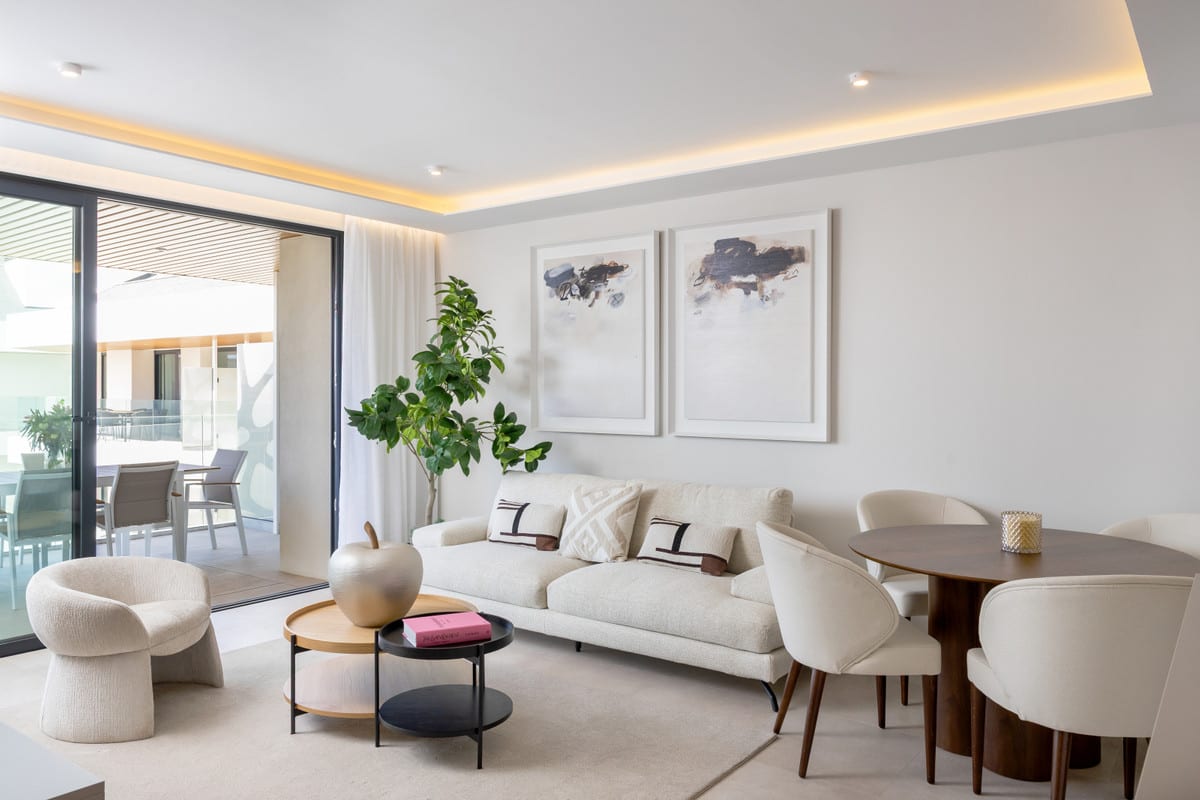 JADE TOWER WITH FURNITURE with a furnished living room, dining area and glass sliding door leading to a covered outdoor space.