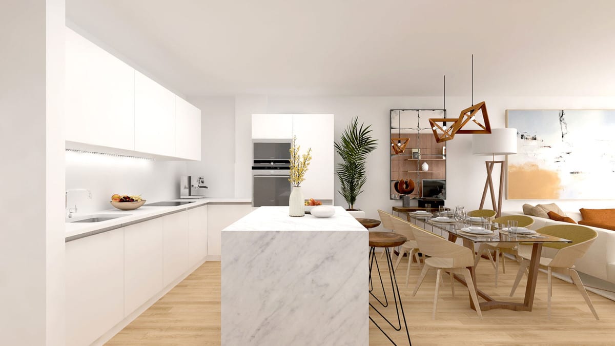 Rendered interior visualisation of JARDINES DE LAS LAGUNAS FASE II featuring a white kitchen, central island with a white marble-effect worktop, built-in ovens, dining table with chairs and adjoining seating area.