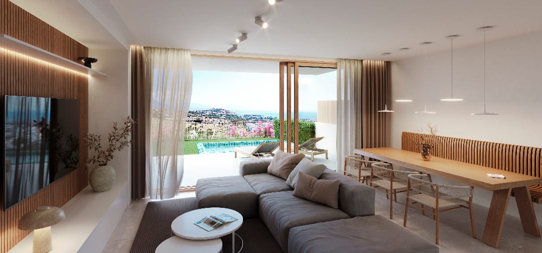 Rendered interior visualisation of KRISTINA VIEWS with a grey modular sofa, round white coffee table, wooden TV wall with indirect lighting, wooden dining table with chairs and open sliding doors leading to a terrace with a swimming pool and views of the surrounding buildings.
