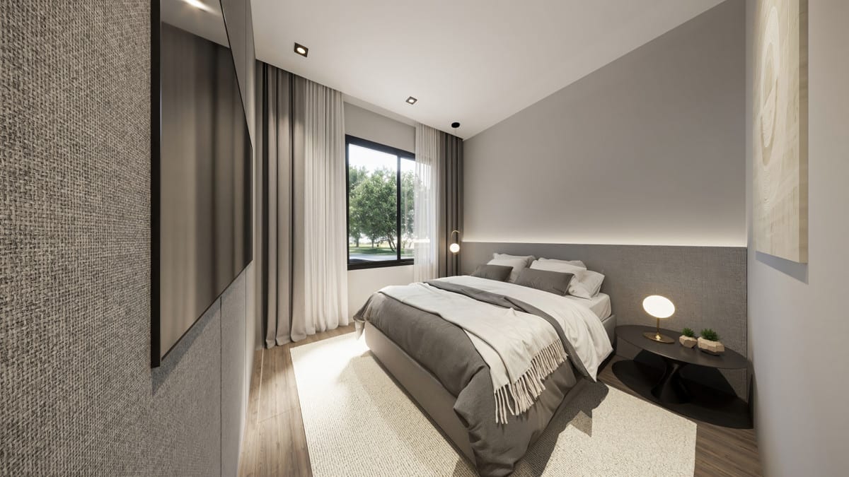 Project visualisation of LANTANA RESIDENCIAL BOUTIQUE featuring a bedroom, double bed with a grey upholstered headboard, a dark bedside table with lamp, full-length curtains and a window overlooking greenery.