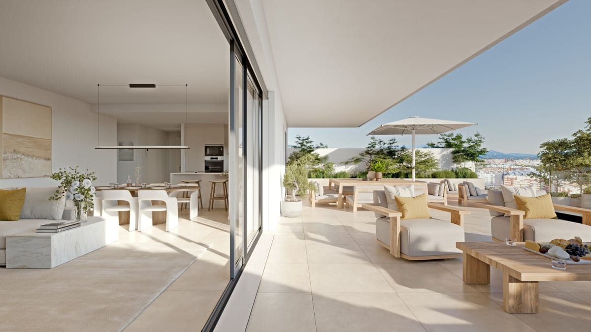 Project visualisation of LAS MESAS SEA SUITE with an open-plan living and dining room, sliding glass doors and a furnished terrace with wooden lounge furniture, a coffee table and parasol.