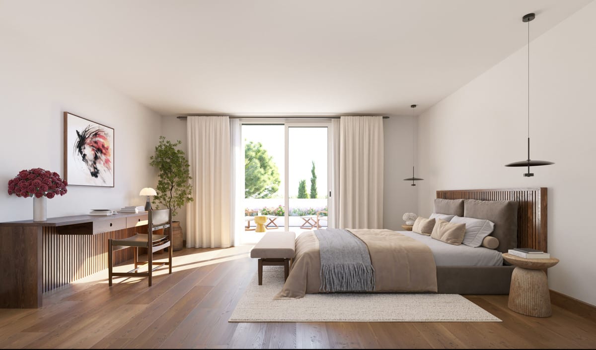 Project visualisation of LAS VILLAS–SOTOGRANDE featuring a bedroom, wooden headboard, desk, pendant light and glass sliding door leading to an outdoor area.
