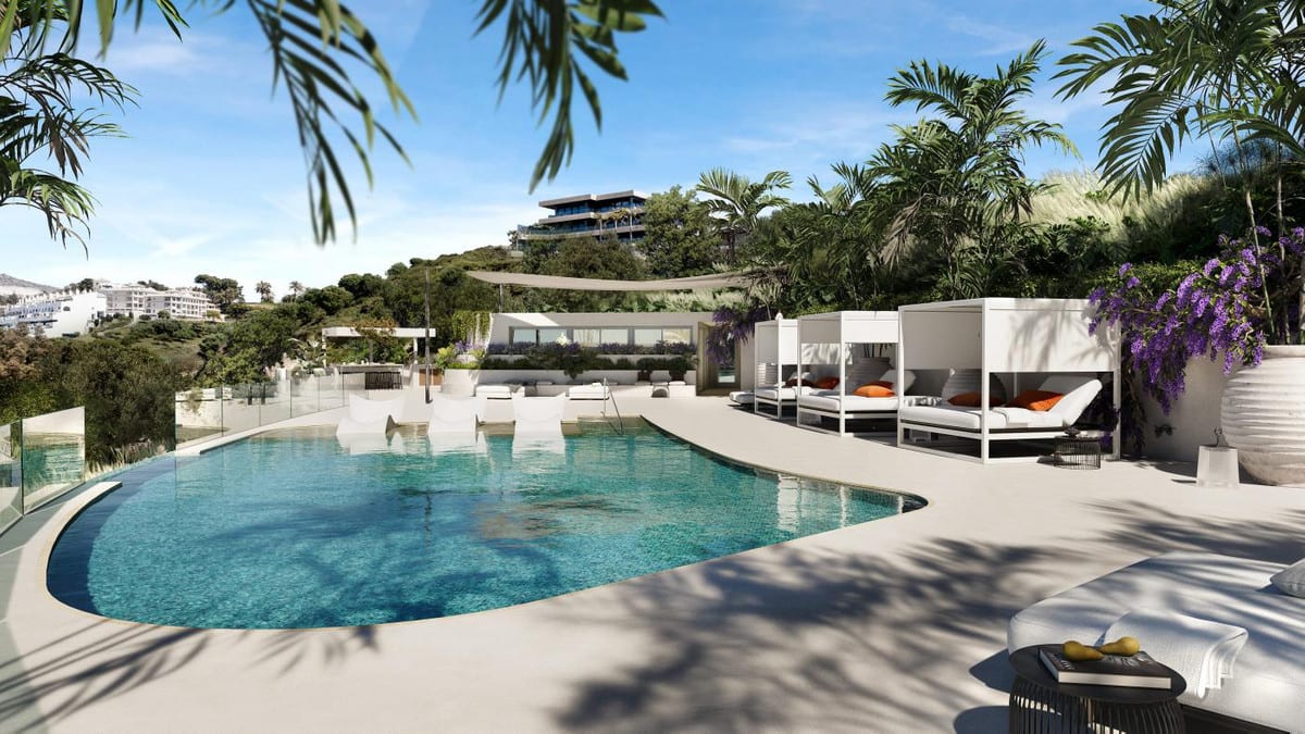 Project visualisation of MACAN BEACH RESIDENCES with a curved swimming pool, sun loungers, white cabanas with orange cushions, shade sails and palm trees.