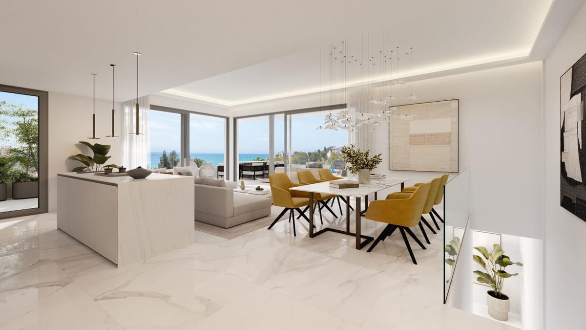 Interior visualisation of MACAN BEACH RESIDENCES with an open-plan kitchen, dining area with yellow chairs, seating area, marble-effect flooring and glazed frontage with sea views.