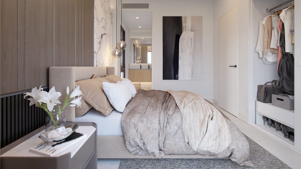 Interior visualization of MALAGA CENTRUM with bedroom, open wardrobe, wall art and view through to the bathroom.