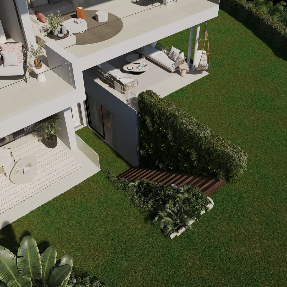 Bird’s-eye project visualisation of MARBELLA CLUB HILLS PHASE II with two terrace levels, light-coloured seating, a hanging chair, green lawn, hedges and a wooden path.