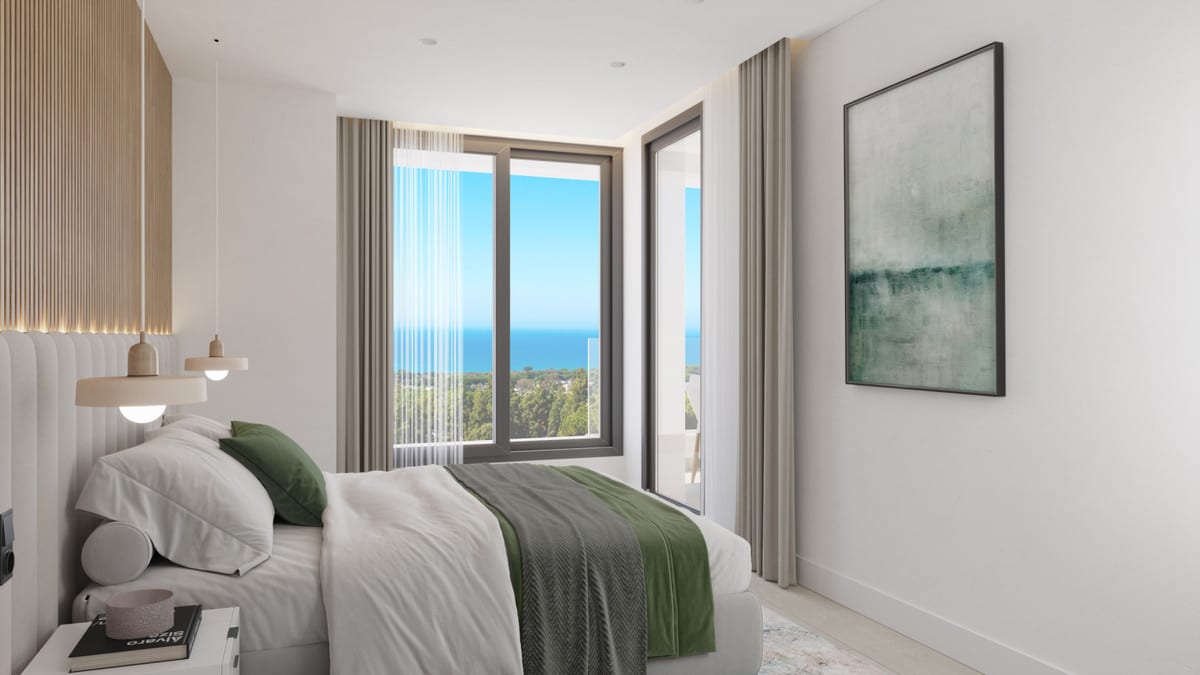 Project visualisation of a bedroom at MILABEKA with a white upholstered bed with green bedding, vertical wooden slatted wall with indirect lighting, hanging globe lights, corner window and a door to the terrace.