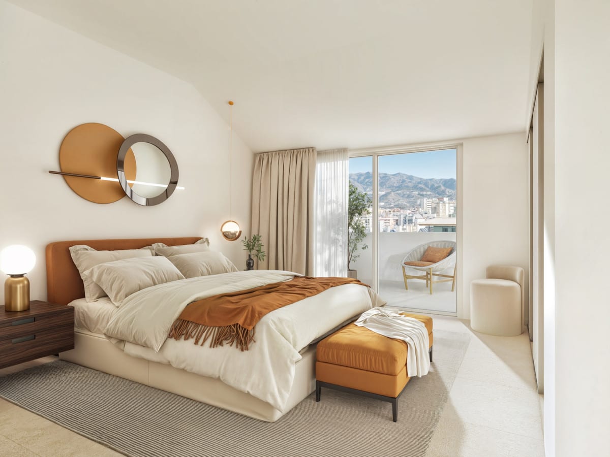Project visualisation of NOVA MARINA showing a bedroom with an upholstered bed featuring an orange headboard, dark wooden bedside table, orange footstool, a round wall mirror and circular wall decoration and a sliding glass door to an outdoor area.