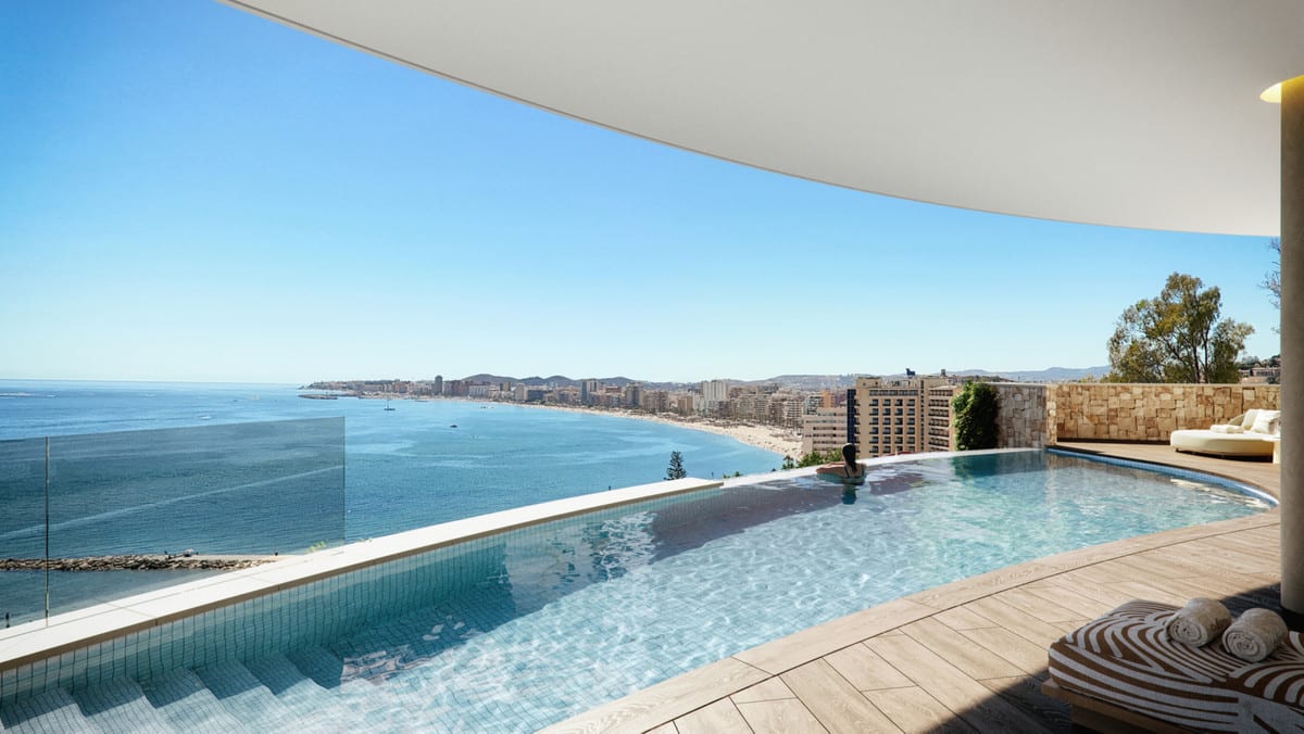 Rendered visualisation of ÓLEO with an infinity pool, glass balustrade, stone terrace surface and views of the sea, beach and a built-up coastline.